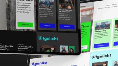 Twee tablets met daarop de website van Movies that matter in light en dark mode