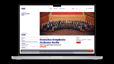 Laptop met een agenda detailpagina van Muziekgebouw Eindhoven op het scherm